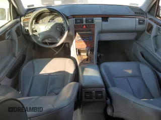 2000 Mercedes-Benz E-Class with VIN WDBJF65J3YB167247, listed as a Copart auction lot 75715464 with 0 mi miles and Salvage Title. Bid and sale history available at carsss.com. Image 8.