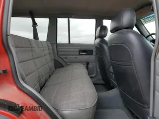 1996 Jeep Cherokee SE z VIN 1J4FJ28S3TL176627, wystawiony jako Copart lot #48173785 z przebiegiem 310 444 mil mil oraz Szkoda całkowita • Salvage title. Historia ofert i sprzedaży dostępna na DreamBid. Obrazek 11.
