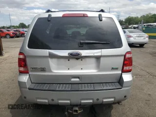 2010 Ford Escape Limited с VIN 1FMCU9EG0AKD42965, выставлен на аукционе Copart как лот 57097545 с пробегом 153 370 миль миль и Списание • Salvage title. История ставок и продаж доступна на DreamBid. Изображение 6.