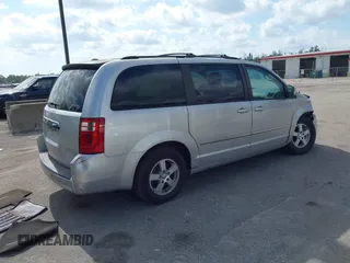 2010 Dodge Grand Caravan SXT with VIN 2D4RN5D15AR196651, listed as a IAAI auction lot 42105957 with 244,374 mi miles and . Bid and sale history available at DreamBid. Image 4.