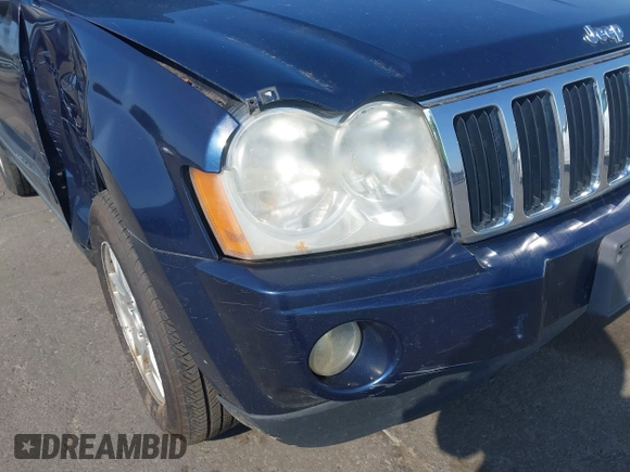 2005 Jeep Grand Cherokee Laredo with VIN 1J4HR48N45C605543, listed as a IAAI auction lot 42612473 with 158,456 mi miles and . Bid and sale history available at DreamBid. Image 13.