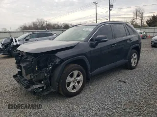 2019 Toyota RAV4 XLE with VIN JTMP1RFV9KD506960, listed as a Copart auction lot 50242025 with 102,157 mi miles and Salvage Title. Bid and sale history available at DreamBid. Image 1.