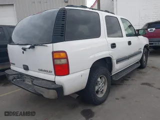 2003 Chevrolet Tahoe Z71 with VIN 1GNEK13T03R247814, listed as a IAAI auction lot 41026670 with 143,990 mi miles. Bid and sale history available at carsss.com. Image 4.