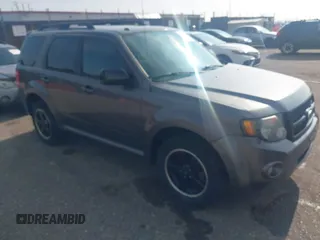 2011 Ford Escape XLT with VIN 1FMCU9D78BKC39019, listed as a IAAI auction lot 41903813 with 226,401 mi miles. Bid and sale history available at carsss.com. Image 1.