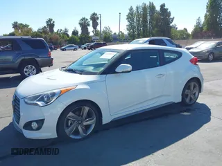 2013 Hyundai Veloster Turbo with VIN KMHTC6AE4DU158224, listed as a IAAI auction lot 42725813 with Not provided miles and . Bid and sale history available at DreamBid. Image 2.