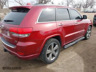 2014 Jeep Grand Cherokee Overland with VIN 1C4RJFCM0EC492833, listed as a IAAI auction lot 41836579 with 120,168 mi miles. Bid and sale history available at carsss.com. Image 4.