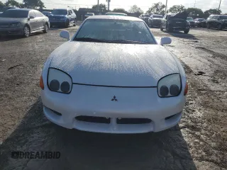 1997 Mitsubishi 3000GT z VIN JA3AM44H9VY006046, wystawiony jako Copart lot #71117954 z przebiegiem 149 701 mil mil oraz Tytuł czysty. Historia ofert i sprzedaży dostępna na DreamBid. Obrazek 5.