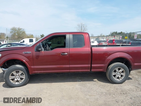 2015 Ford F-150 XLT with VIN 1FTFX1EF9FFA86164, listed as a IAAI auction lot 42112185 with 115,871 mi miles and . Bid and sale history available at DreamBid. Image 14.