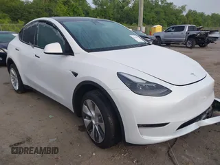 2023 Tesla Model Y Long Range with VIN 7SAYGDEE4PF770307, listed as a IAAI auction lot 42141175 with 34,901 mi miles and . Bid and sale history available at carsss.com. Image 1.