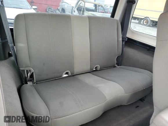 2004 Jeep Wrangler Sahara with VIN 1J4FA59SX4P713343, listed as a Copart auction lot 53608265 with 113,828 mi miles and Salvage title. Bid and sale history available at DreamBid. Image 10.