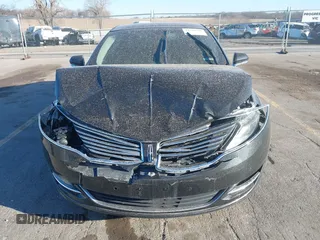2013 Lincoln MKZ z VIN 3LN6L2G94DR817880, wystawiony jako IAAI lot #41790309 z przebiegiem 167 761 mil mil oraz . Historia ofert i sprzedaży dostępna na DreamBid. Obrazek 12.