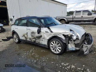 2018 MINI Clubman Cooper with VIN WMWLU1C52J2F29454, listed as a Copart auction lot 74735814 with 101,013 mi miles and Salvage Title. Bid and sale history available at carsss.com. Image 4.