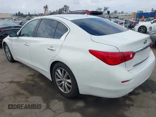 2014 Infiniti Q50 Premium z VIN JN1BV7APXEM670656, wystawiony jako IAAI lot #42085636 z przebiegiem 88 147 mil mil oraz . Historia ofert i sprzedaży dostępna na DreamBid. Obrazek 3.