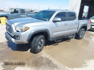 2018 Toyota Tacoma SR with VIN 3TMCZ5AN3JM170037, listed as a IAAI auction lot 42565385 with 157,450 mi miles and . Bid and sale history available at DreamBid. Image 17.