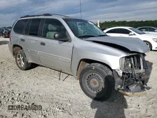 2004 GMC Envoy SLE with VIN 1GKDS13S142309781, listed as a Copart auction lot 73502854 with 349,449 mi miles and Salvage Title. Bid and sale history available at carsss.com. Image 4.
