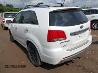 2012 Kia Sorento SX z VIN 5XYKWDA23CG231228, wystawiony jako IAAI lot #42366536 z przebiegiem 154 627 mil mil oraz . Historia ofert i sprzedaży dostępna na DreamBid. Obrazek 3.