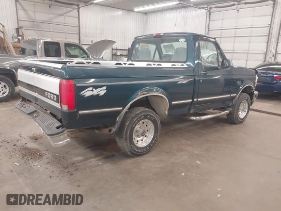 1994 Ford F-150 with VIN 1FTEF14N3RLB18233, listed as a IAAI auction lot 42193773 with 211,804 mi miles and . Bid and sale history available at DreamBid. Image 4.