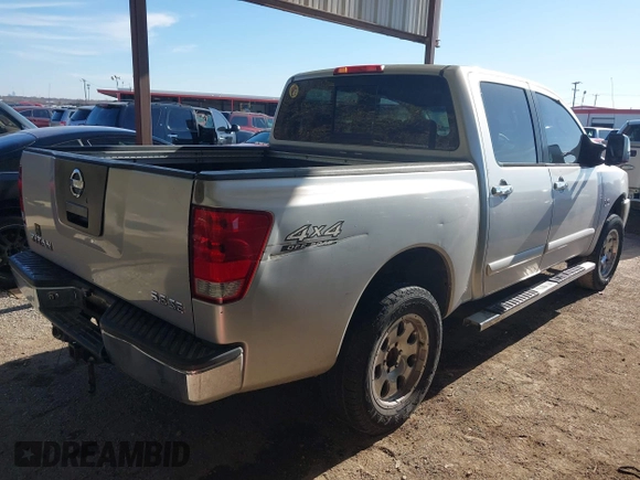 2004 Nissan Titan LE z VIN 1N6AA07BX4N537229, wystawiony jako IAAI lot #41234790 z przebiegiem 210 475 mil mil oraz . Historia ofert i sprzedaży dostępna na DreamBid. Obrazek 4.