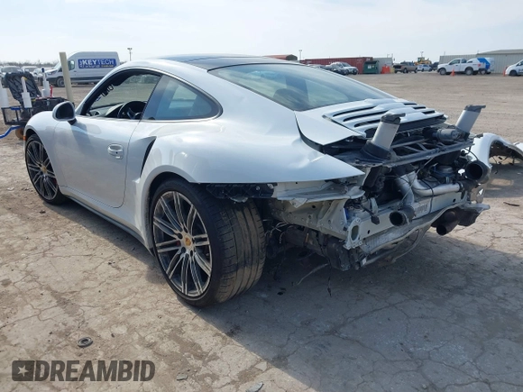 2016 Porsche 911 Turbo with VIN WP0AD2A97GS166077, listed as a IAAI auction lot 41568972 with 26,064 mi miles. Bid and sale history available at carsss.com. Image 3.