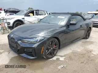 2022 BMW 4 Series M440i with VIN WBA53AT06NCK11740, listed as a Copart auction lot 63387673 with 10,184 mi miles and . Bid and sale history available at DreamBid. Image 1.