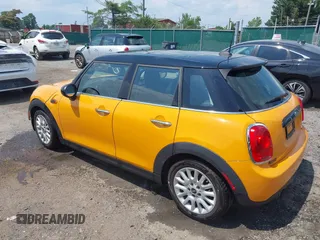 2016 MINI Hardtop 4 Door z VIN WMWXU1C53G2D08424, wystawiony jako IAAI lot #42509304 z przebiegiem 97 729 mil mil oraz . Historia ofert i sprzedaży dostępna na DreamBid. Obrazek 3.