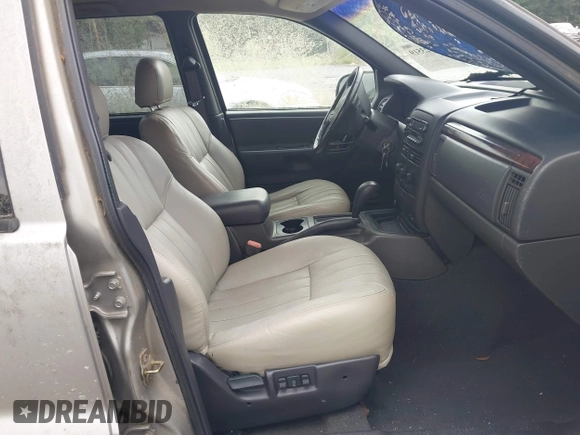 2000 Jeep Grand Cherokee Laredo z VIN 1J4G248N2YC334566, wystawiony jako IAAI lot #42623519 z przebiegiem Nie podano mil oraz . Historia ofert i sprzedaży dostępna na DreamBid. Obrazek 5.