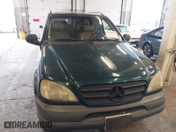 1998 Mercedes-Benz M-Class with VIN 4JGAB54E1WA011086, listed as a IAAI auction lot 41534717 with 186,273 mi miles. Bid and sale history available at carsss.com. Image 12.