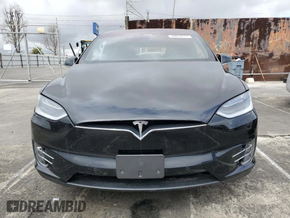 2018 Tesla Model X 75D with VIN 5YJXCBE24JF130216, listed as a Copart auction lot 48894215 with 75,694 mi miles and Salvage Title. Bid and sale history available at carsss.com. Image 5.