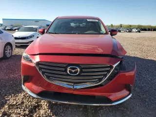 2016 Mazda CX-9 Touring z VIN JM3TCACYXG0121793, wystawiony jako Copart lot #49436395 z przebiegiem 100 354 mil mil oraz Szkoda całkowita • Salvage title. Historia ofert i sprzedaży dostępna na DreamBid. Obrazek 5.