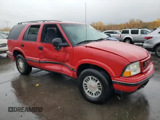 1998 GMC Jimmy SLE with VIN 1GKDT13W1W2508350, listed as a Copart auction lot 77904394 with 175,000 mi miles and Salvage Title. Bid and sale history available at carsss.com. Image 4.