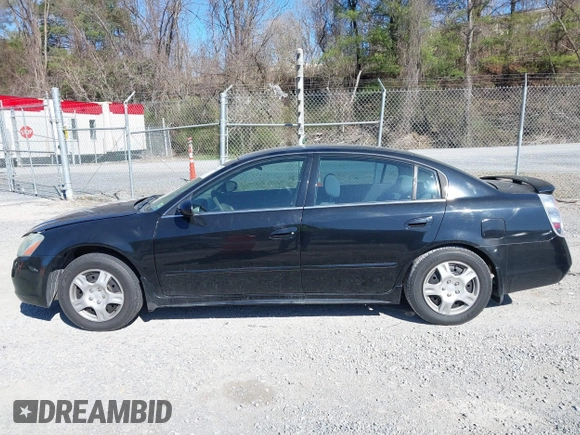2003 Nissan Altima S with VIN 1N4AL11D33C320084, listed as a IAAI auction lot 41849903 with 212,137 mi miles. Bid and sale history available at carsss.com. Image 14.