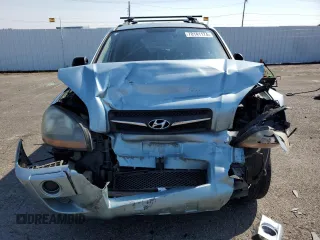 2009 Hyundai Tucson GLS with VIN KM8JM12B29U953176, listed as a Copart auction lot 70141174 with 77,132 mi miles and Salvage Title. Bid and sale history available at carsss.com. Image 5.