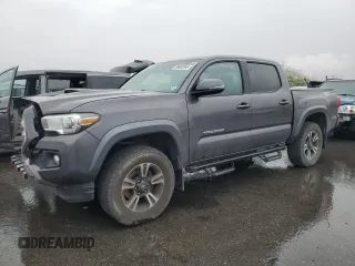 2016 Toyota Tacoma SR5 z VIN 5TFAZ5CN5GX010166, wystawiony jako Copart lot #55692695 z przebiegiem 171 850 mil mil oraz Szkoda całkowita • Salvage title. Historia ofert i sprzedaży dostępna na DreamBid. Obrazek 1.