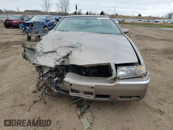 2000 Cadillac Eldorado with VIN 1G6EL12Y5YU166723, listed as a Copart auction lot 82612034 with 80,839 mi miles and Salvage title. Bid and sale history available at DreamBid. Image 5.