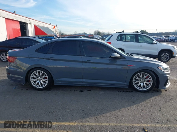 2020 Volkswagen Jetta GLI S with VIN 3VW6T7BU8LM099899, listed as a IAAI auction lot 41361494 with 92,219 mi miles and . Bid and sale history available at DreamBid. Image 13.