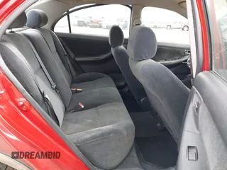 2003 Toyota Corolla CE with VIN 2T1BR32E53C132755, listed as a IAAI auction lot 41936318 with 299,999 mi miles and . Bid and sale history available at DreamBid. Image 8.