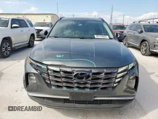 2022 Hyundai Tucson SEL with VIN 5NMJC3AE8NH139520, listed as a Copart auction lot 50745605 with 31,588 mi miles and Salvage Title. Bid and sale history available at carsss.com. Image 5.