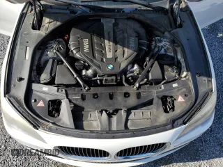 2012 BMW 7 Series 750Li z VIN WBAKB8C53CC852495, wystawiony jako Copart lot #50811745 z przebiegiem 155 512 mil mil oraz Szkoda całkowita • Salvage title. Historia ofert i sprzedaży dostępna na DreamBid. Obrazek 11.