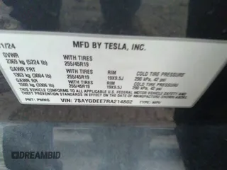 2024 Tesla Model Y Long Range z VIN 7SAYGDEE7RA214802, wystawiony jako IAAI lot #41118623 z przebiegiem 12 336 mil mil oraz . Historia ofert i sprzedaży dostępna na DreamBid. Obrazek 9.