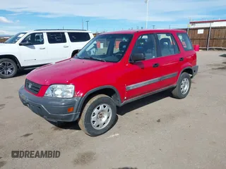1999 Honda CR-V LX with VIN JHLRD1841XC071583, listed as a IAAI auction lot 41657213 with 208,874 mi miles. Bid and sale history available at carsss.com. Image 2.