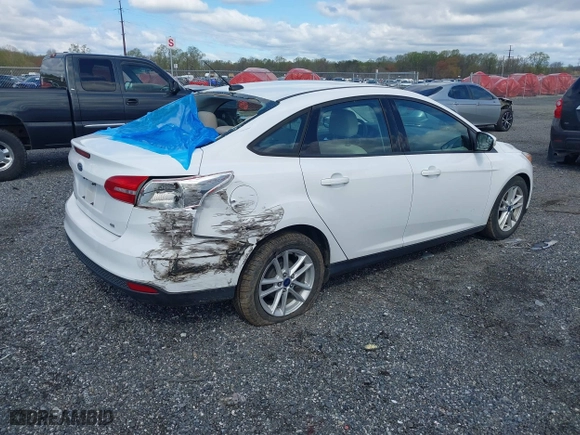 2017 Ford Focus SE with VIN 1FADP3F21HL234669, listed as a IAAI auction lot 42040873 with 44,117 mi miles. Bid and sale history available at carsss.com. Image 4.