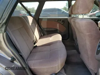 1995 Subaru Legacy L with VIN 4S3BK6353S7328522, listed as a Copart auction lot 71933944 with 60,105 mi miles and Salvage title. Bid and sale history available at DreamBid. Image 11.