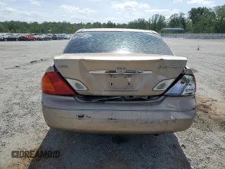 2001 Toyota Avalon XL z VIN 4T1BF28B41U191680, wystawiony jako Copart lot #53956735 z przebiegiem 177 149 mil mil oraz Szkody całkowita. Historia ofert i sprzedaży dostępna na DreamBid. Obrazek 6.