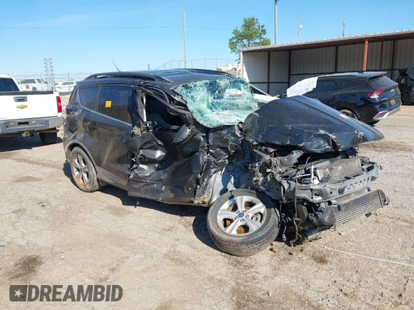 2015 Ford Escape SE with VIN 1FMCU9G90FUB98294, listed as a IAAI auction lot 41865286 with Not Provided miles. Bid and sale history available at carsss.com. Image 1.