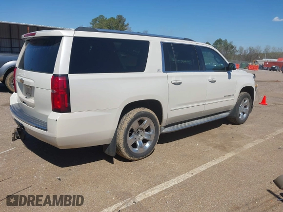 2015 Chevrolet Suburban LTZ with VIN 1GNSCKKC3FR113388, listed as a IAAI auction lot 41867964 with 238,530 mi miles and . Bid and sale history available at DreamBid. Image 4.