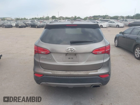 2016 Hyundai Santa Fe z VIN 5XYZU3LB3GG370826, wystawiony jako IAAI lot #42325158 z przebiegiem 146 916 mil mil oraz . Historia ofert i sprzedaży dostępna na DreamBid. Obrazek 16.