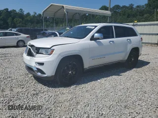 2014 Jeep Grand Cherokee Summit z VIN 1C4RJFJM8EC334758, wystawiony jako Copart lot #63652955 z przebiegiem 151 532 mil mil oraz Szkoda całkowita • Salvage title. Historia ofert i sprzedaży dostępna na DreamBid. Obrazek 1.