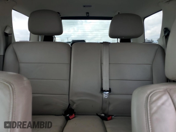 2010 Ford Escape Hybrid with VIN 1FMCU4K30AKC51022, listed as a Copart auction lot 51014615 with 128,275 mi miles and Salvage title. Bid and sale history available at DreamBid. Image 10.