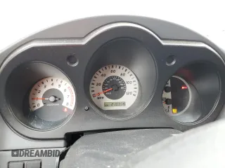 2004 Nissan Frontier XE with VIN 1N6ED29X64C478172, listed as a Copart auction lot 49031985 with 210,354 mi miles and Salvage title. Bid and sale history available at DreamBid. Image 9.