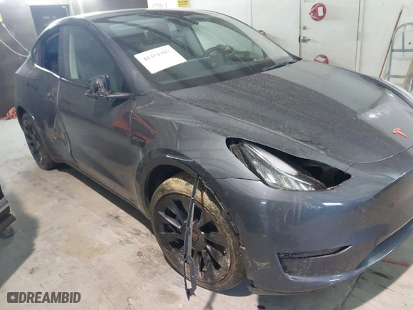 2023 Tesla Model Y Long Range with VIN 7SAYGDEE3PA034830, listed as a IAAI auction lot 41351397 with 26,704 mi miles. Bid and sale history available at carsss.com. Image 6.